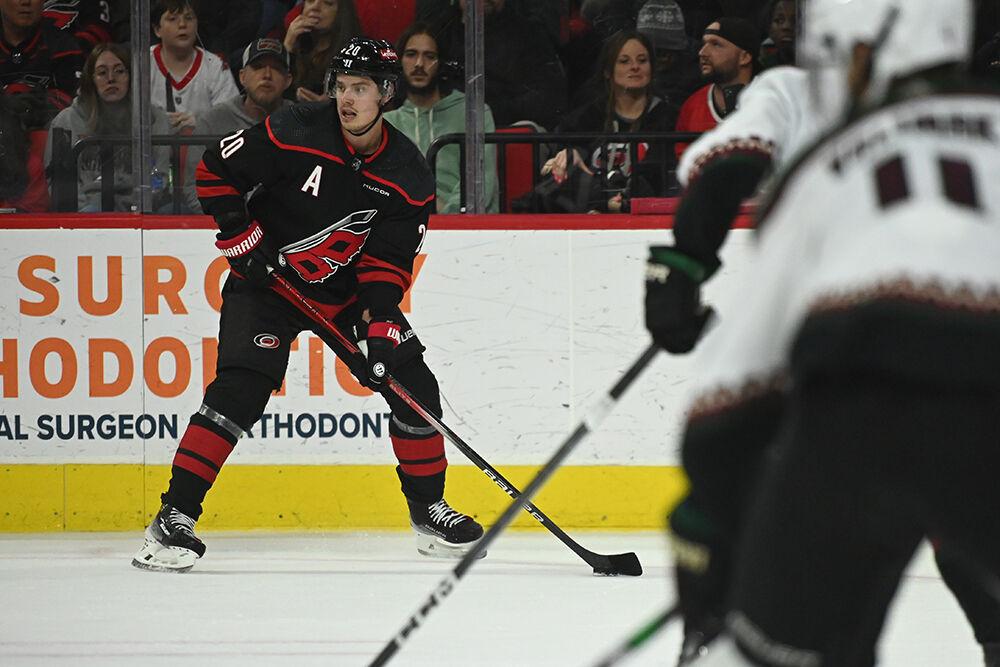Carolina centreman Sebastian Aho looks to pass during the Hurricanes' home game against the Arizona Coyotes in PNC Arena on Saturday, Jan. 27, 2024. The Hurricanes beat the Coyotes 3-1.