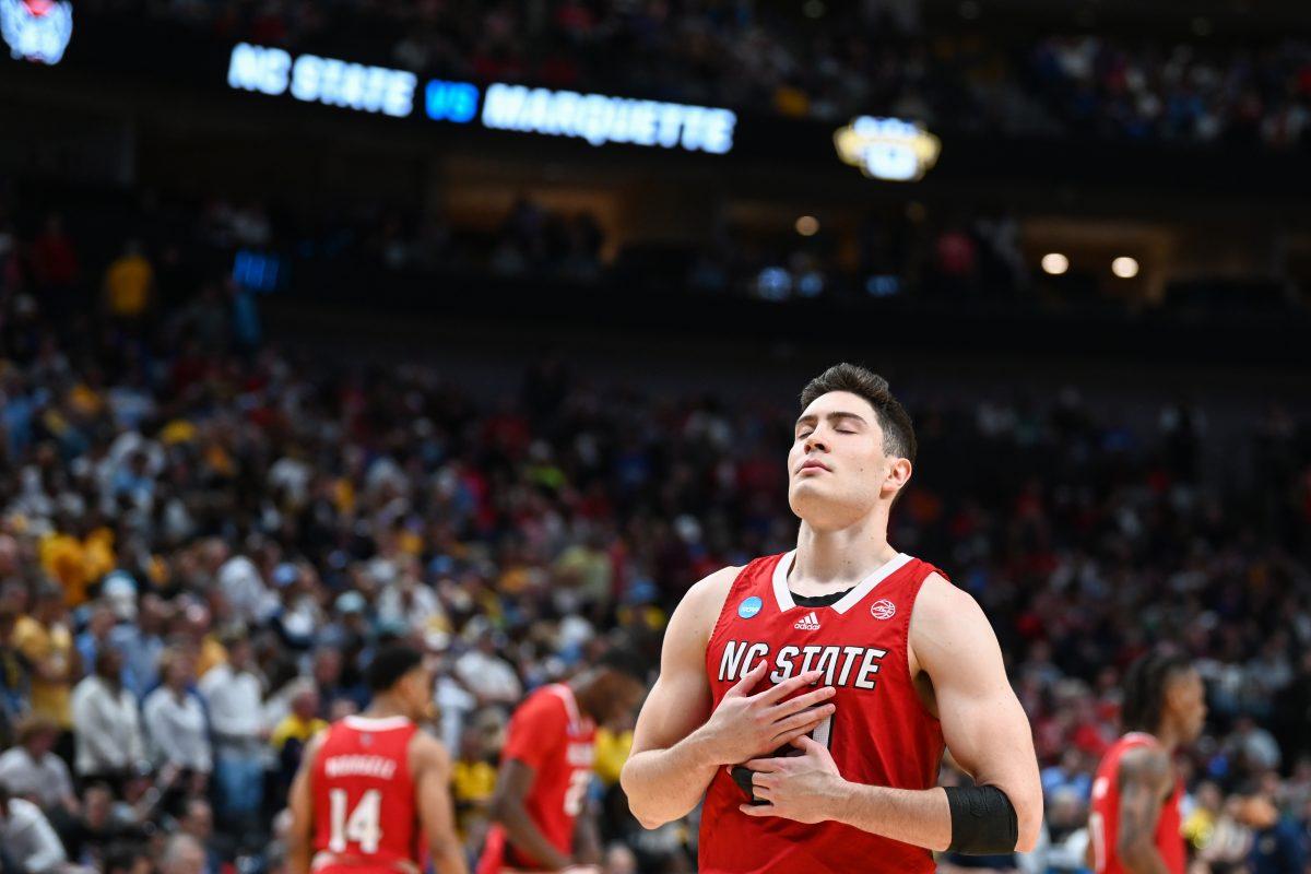 Graduate guard Michael O'Connell takes a deep breath before the Sweet 16 game of the NCAA Tournament against Marquette at American Airlines Center in Dallas on Friday, March 29, 2024. O'Connell scored eight points, made two rebounds and two assists. NC State beat Marquette 67-58.