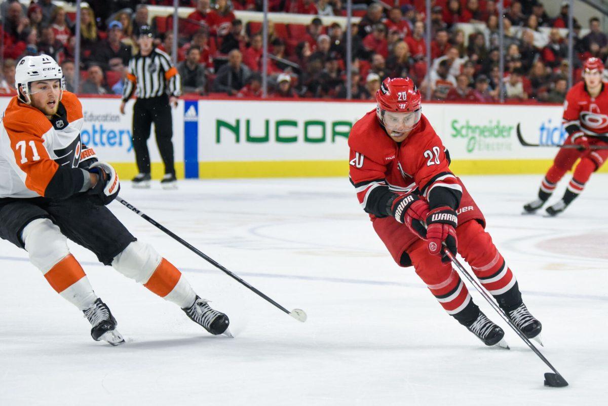 Center Sebastian Aho controls the puck during the game against the Philadelphia Flyers in PNC Arena on March 21, 2024. The Hurricanes defeated the Flyers 3-2 in overtime.