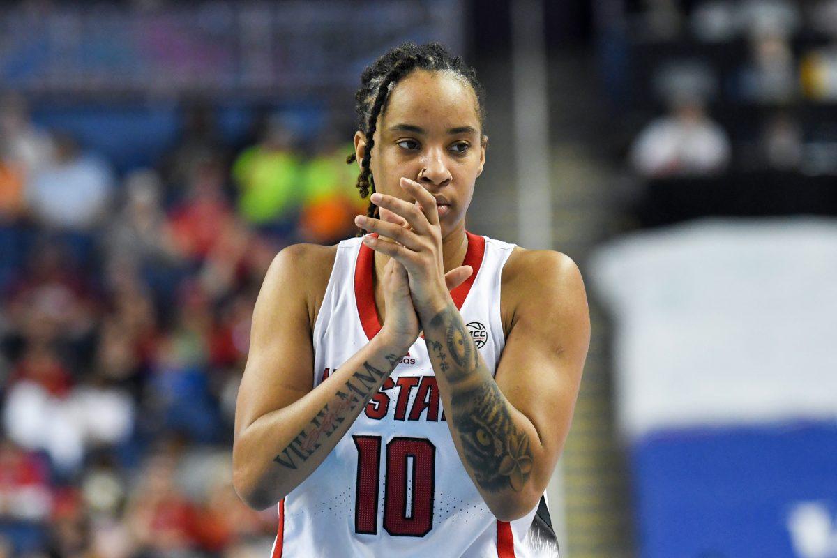 Junior guard Aziaha James claps during the quarterfinals game of the ACC Tournament against Duke in Greensboro Coliseum on Friday, March 8, 2024. James led the team in points scored, gaining 16 for the Wolfpack. NC State won the game 54-51.