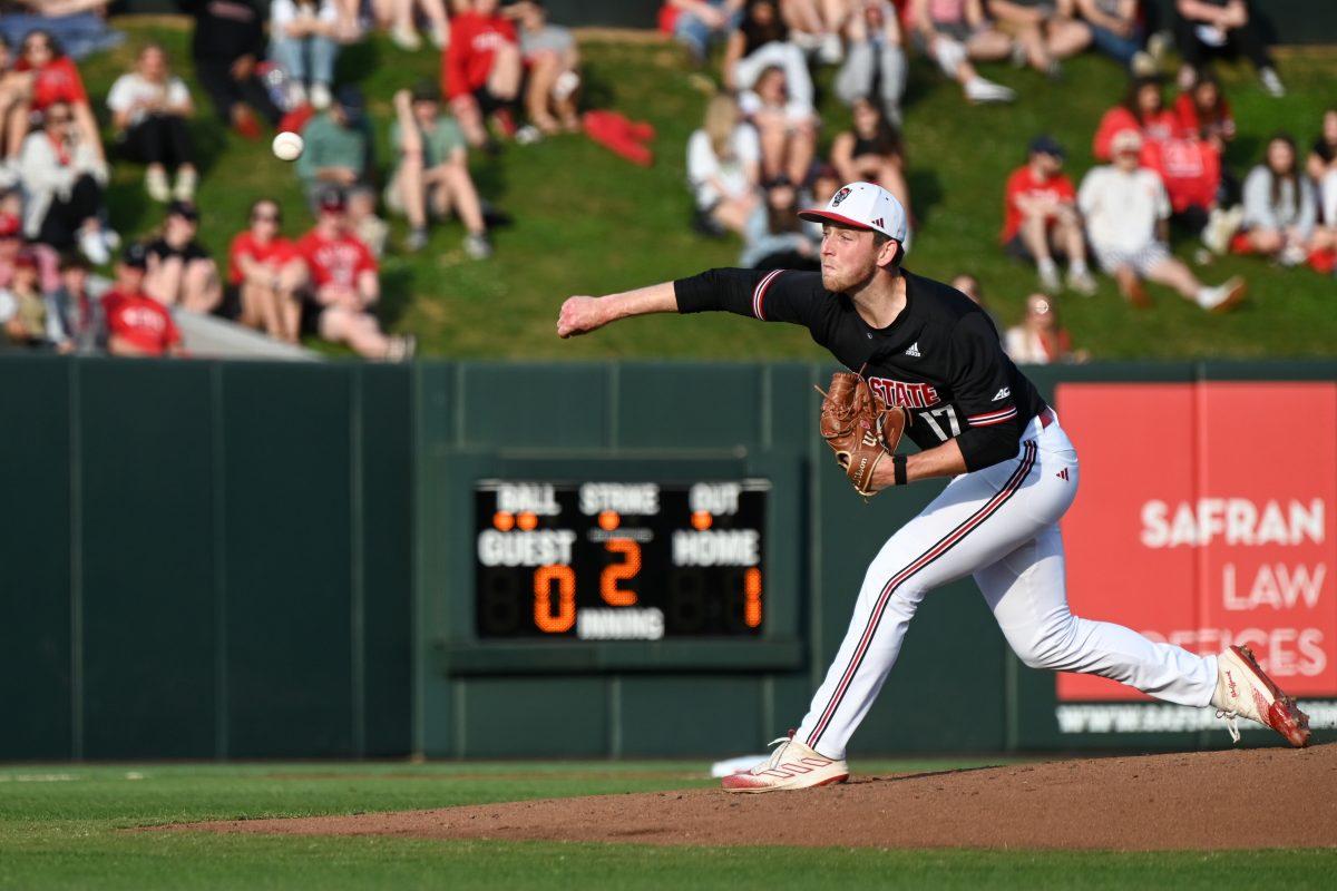 Graduate pitcher Sam Highfill pitches during the game against Ball State at Doak Field at Dail Park on Friday, April 26, 2024. Highfill recorded six strikeouts in 6.0 innings pitched. NC State beat Ball State 10-2.