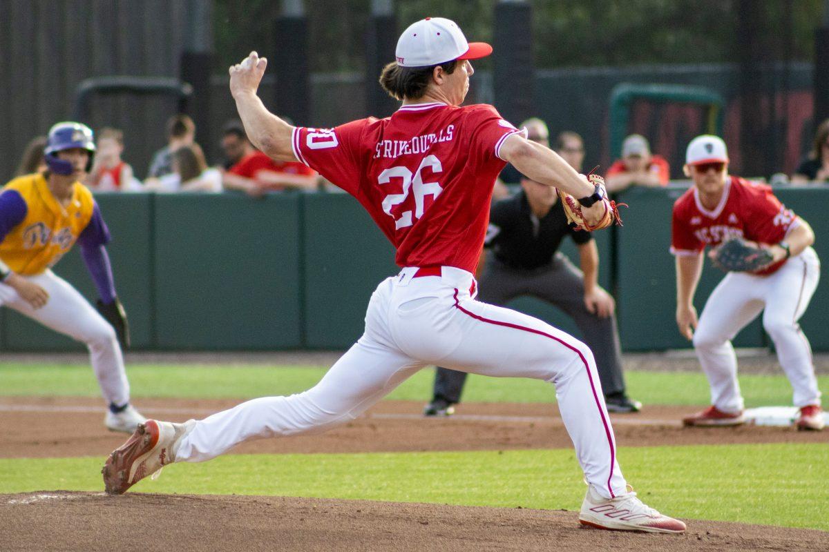 Freshman pitcher Ryan Marohn pitches the ball during the game against ECU at Doak Field at Dail Park on Tuesday, April 2, 2024. Marohn pitched 4.1 innings during the game. NC State lost to ECU 12-4.