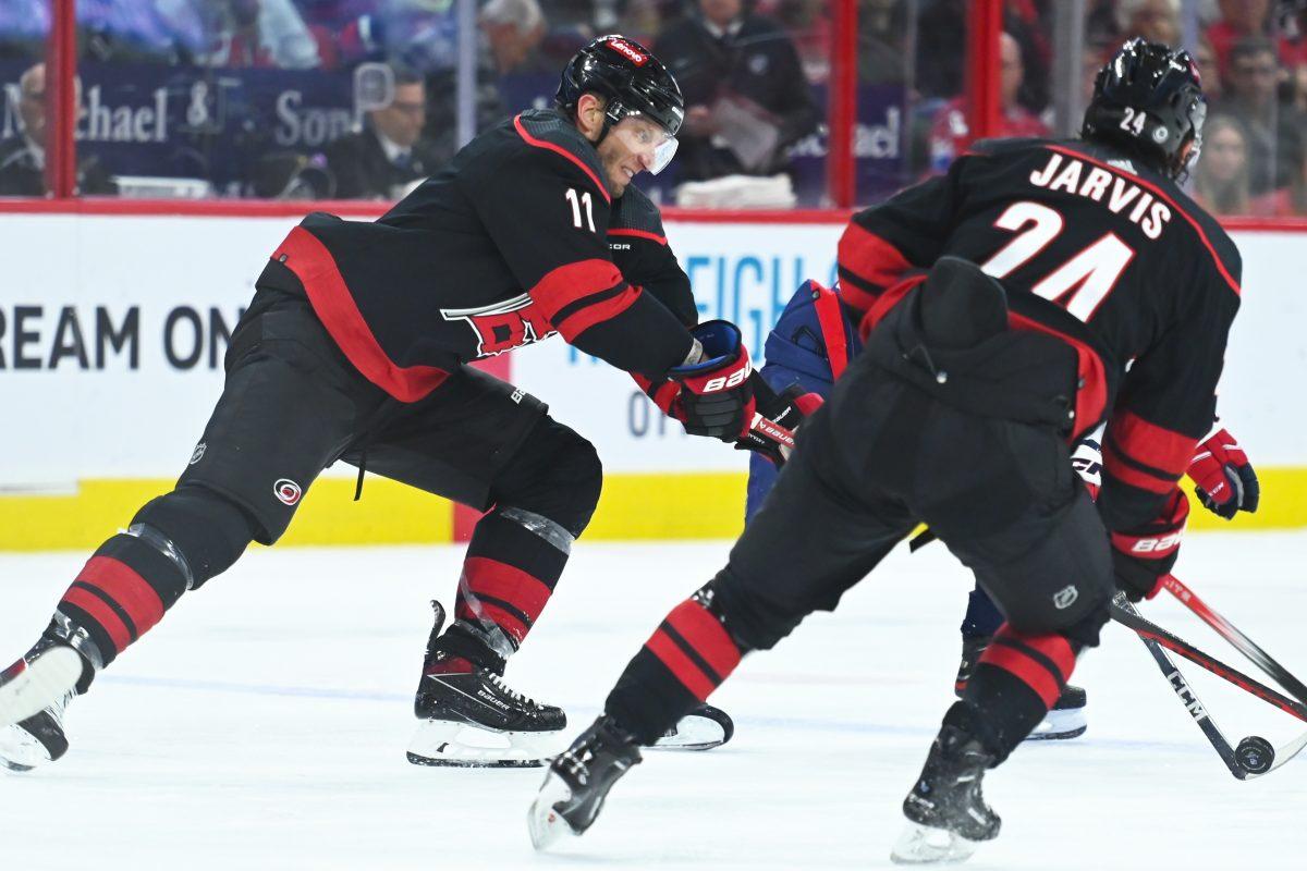 Center Jordan Staal battles for the puck during the Carolina Hurricanes game versus the Washington Capitals at PNC Arena on Friday, April 5, 2024. The Hurricanes beat the Capitals 4-2.