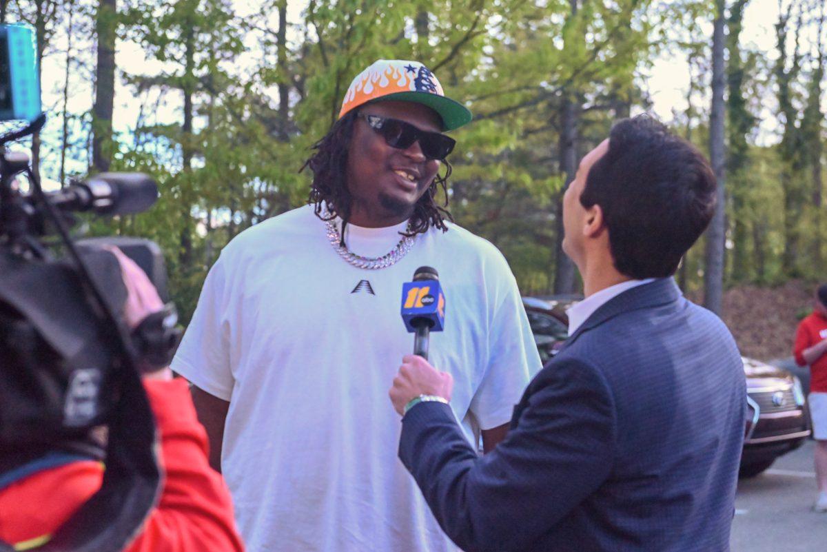 Graduate forward DJ Burns during a interview. NC State fans greeted the men's basketball team after their NCAA Tournament Final Four game back to campus at the Dail Basketball Center on Sunday, April 7, 2024.