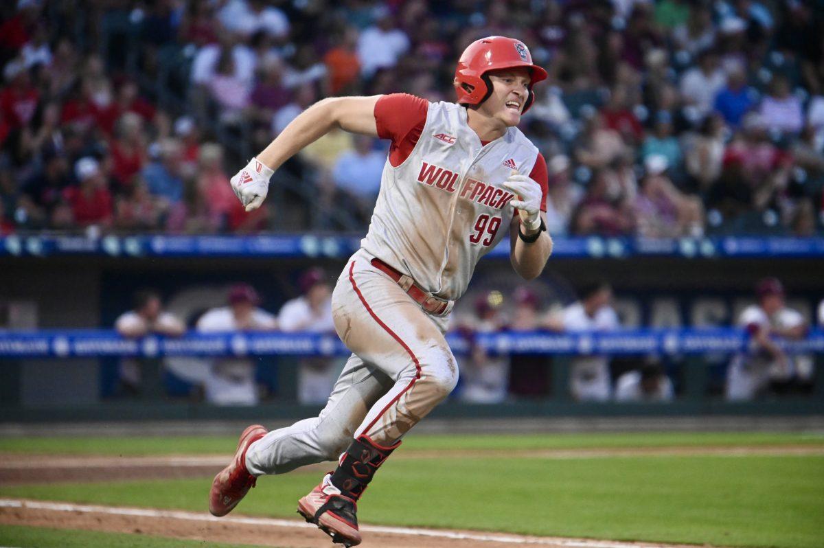Graduate infielder Alec Makarewicz runs to first base during the Wolfpack's first game of the ACC Baseball Championship against the Virginia Tech Hokies on Truist Field in Charlotte, NC on Wednesday, May 22, 2024. The Wolfpack beat the Hokies 19-9.