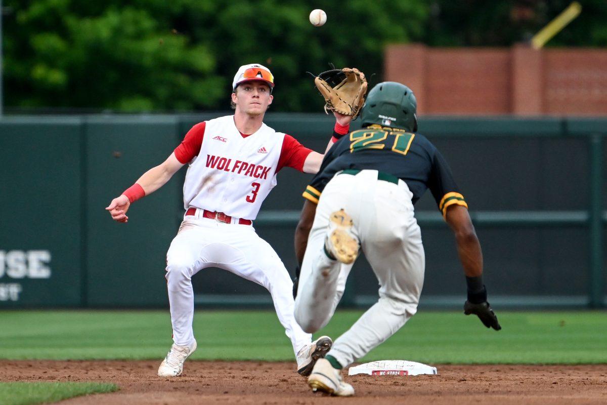 Freshman infielder Brandon Butterworth tags a runner out at second base during the game against Norfolk State at Doak Field at Dail Park on Tuesday, May 7, 2024. Butterworth scored one run and had two RBIs. NC State beat Norfolk State 18-0 in seven innings.