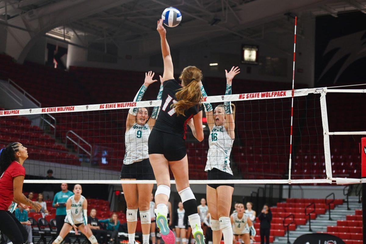 Senior opposite hitter Amanda Rice spikes the ball during the game against Coastal Carolina in Reynolds Coliseum on Sunday, Sept. 22, 2024. Rice had 18 kills. The Wolfpack lost to the Chanticleers 3-2.