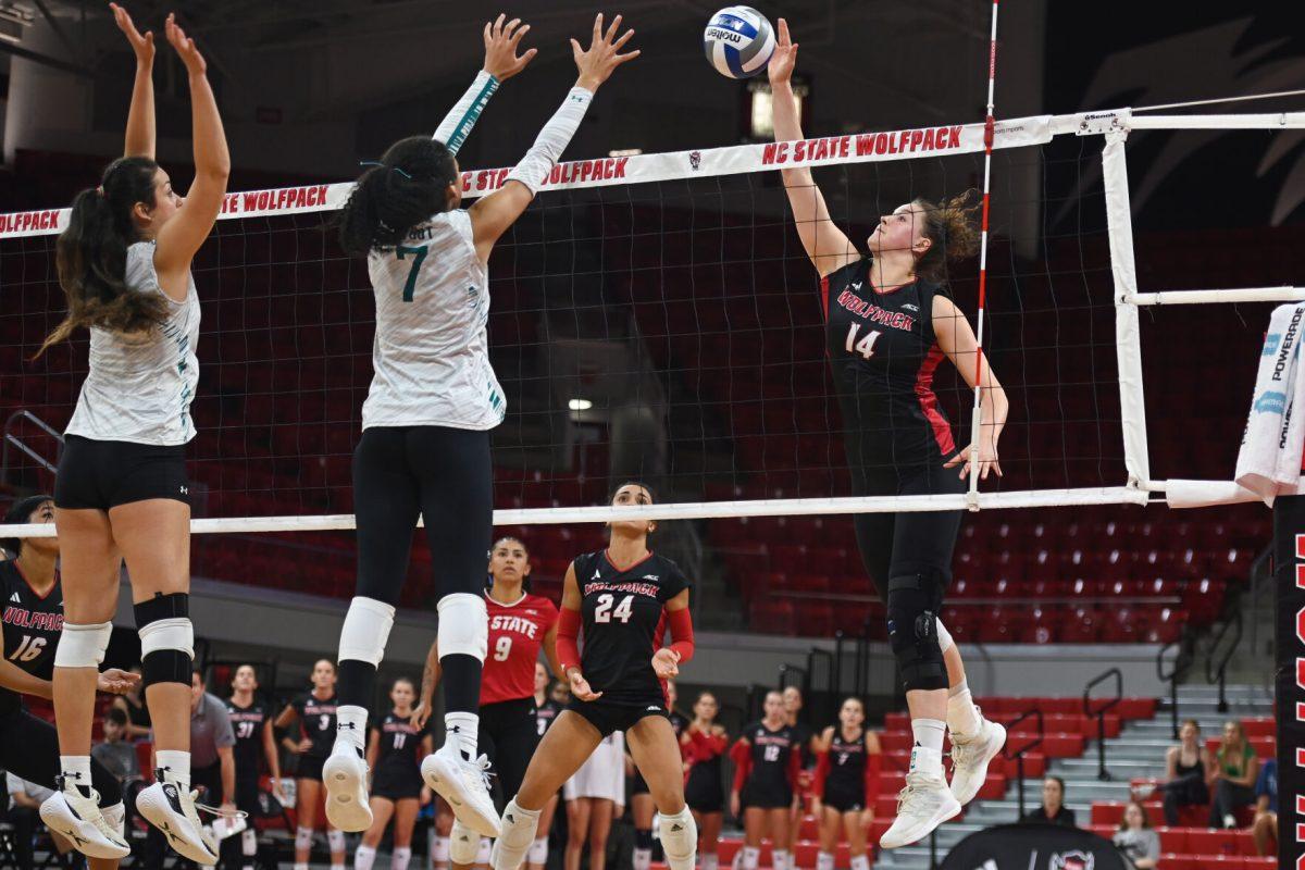 Senior outside hitter Martyna Leoniak tips the ball during the game against Coastal Carolina in Reynolds Coliseum on Sunday, Sept. 22, 2024. Leoniak had 11 digs. The Wolfpack lost to the Chanticleers 3-2.