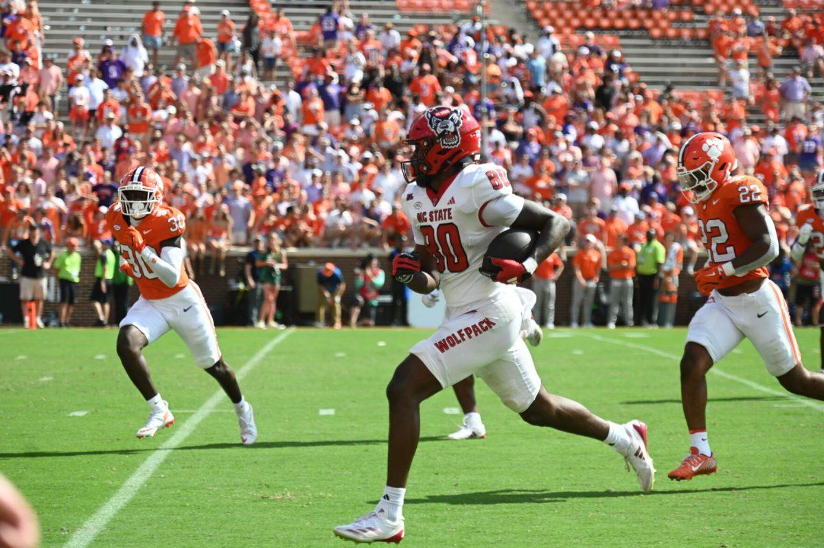 Freshman wide receiver Terrell Anderson runs towards the endzone during the football game against Clemson in Memorial Stadium on Saturday, Sept. 21, 2024. Anderson scored one touchdown and earned 40 net yards. The Wolfpack lost to the Tigers 59-35.