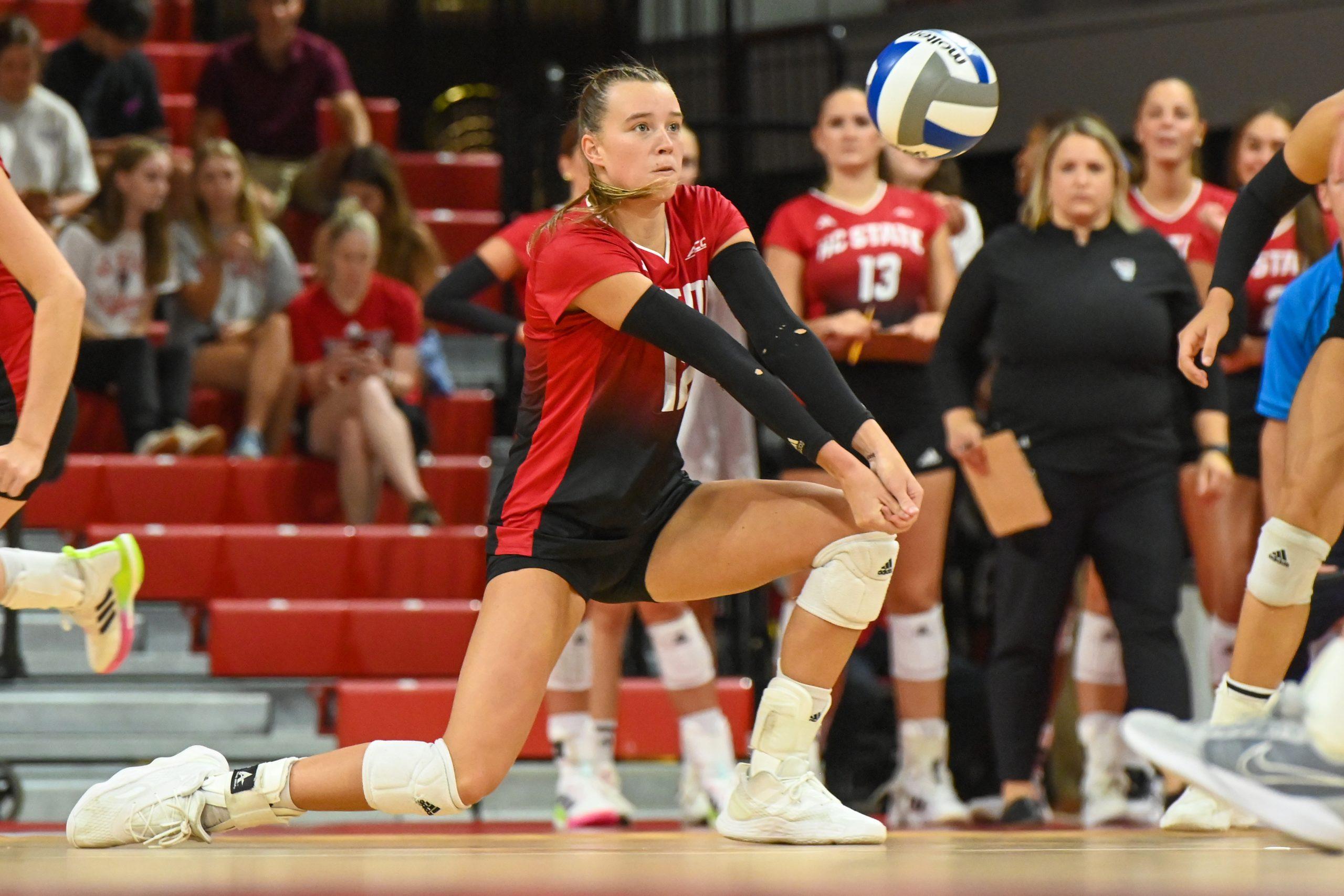 Junior outside hitter Courtney Bryant bumps the ball during the match against Liberty in Reynolds Coliseum on Wednesday, Sept. 11, 2024. Bryant made 16 digs. The Wolfpack defeated the Flames 3-1.