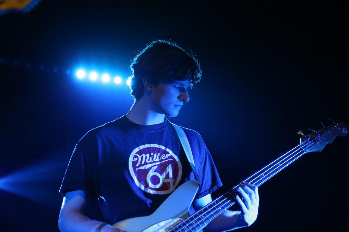 Ethan Johnson, bass player for Odd39, focuses during Indie Night at Portal HQ on Thursday, Nov. 21, 2024. Johnson established Odd39 this year with his band members Drew Scott, Ant Vocaturo and Jay Meland.