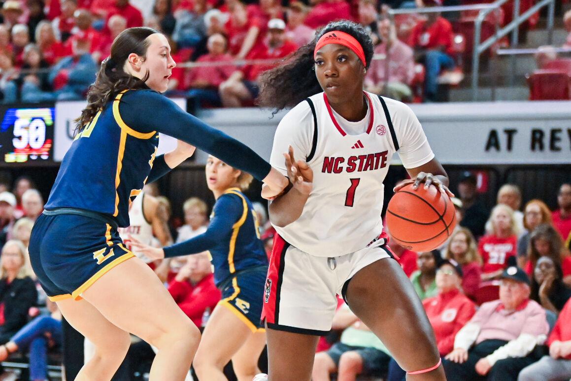 Freshman center Lorena Awou dribbles in the post during the game against East Tennessee State in Reynolds Coliseum on Tuesday, November 5, 2024. The wolfpack won against buccaneers 80-55.