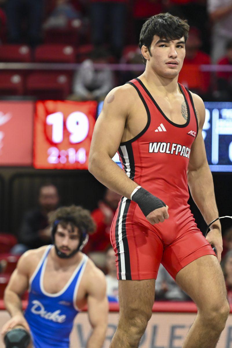Redshirt sophomore Matty Singleton defeats his opponent during the duel against Duke in Reynolds Coliseum on Friday, Jan. 10, 2025. NC State beat Duke 47-0.