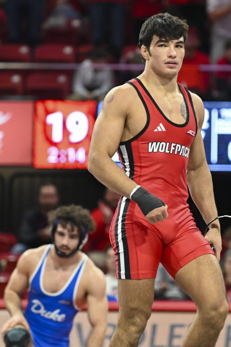 Redshirt sophomore Matty Singleton defeats his opponent during the duel against Duke in Reynolds Coliseum on Friday, Jan. 10, 2025. NC State beat Duke 47-0.