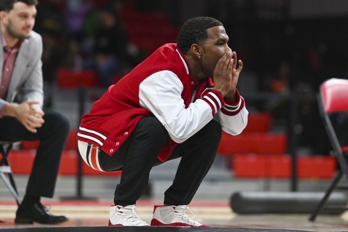 Redshirt freshman Vince Robinson yells at his teammate during the duel against Duke in Reynolds Coliseum on Friday, Jan. 10, 2025. NC State beat Duke 47-0.