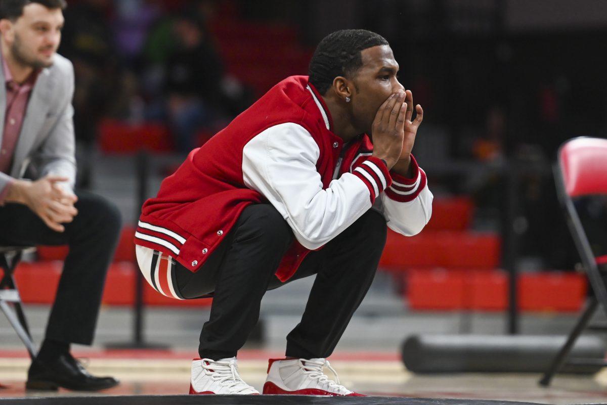 Redshirt freshman Vince Robinson yells at his teammate during the duel against Duke in Reynolds Coliseum on Friday, Jan. 10, 2025. NC State beat Duke 47-0.