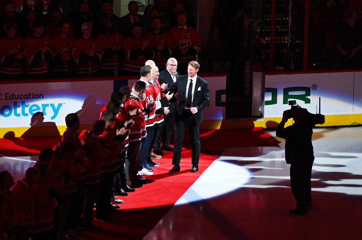 Former Hurricanes team captain Eric Staal walks onto the ice during the Eric Staal retirement ceremony at Lenovo Center on Sunday, Jan 12, 2025. Staal was inducted into the Hurricanes Hall of Fame and his jersey, #12, was raised into the rafters.