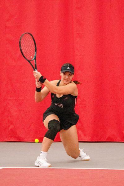 Freshman Michaela Laki during the match against Michigan at J.W. Isenhour Tennis Center on Friday, Feb. 14, 2025. Laki lost her singles match 2-0. NC State beat Michigan 5-2.