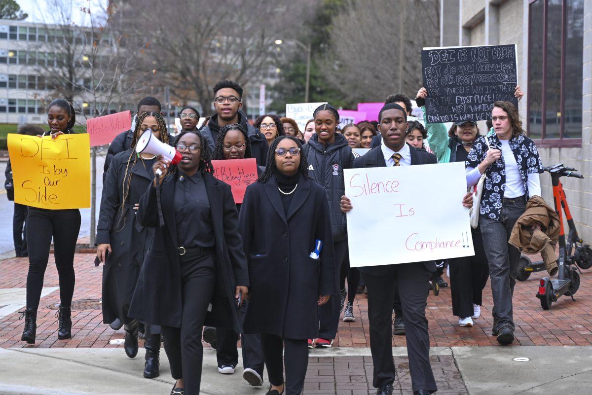 Students march down Cates Avenue on Wednesday, Feb. 12, 2025. Organized by members of the National Pan-Hellenic Council, the march was held in support of diversity, equity and inclusion. "When they strip DEI from our education, they are telling us that diversity does not matter, that equity is optional and inclusion is negotiable. But we know better," said Nayah McKenzie, a third-year studying criminology and one of the march organizers.
