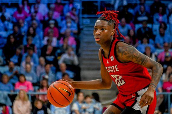 NC State guard Saniya Rivers dribbles down the court during the game against UNC on Sunday, Feb. 16, 2025, in Carmichael Arena. Rivers finished with 14 points and four assists. The Wolfpack fell to the Tar Heels 66-65.