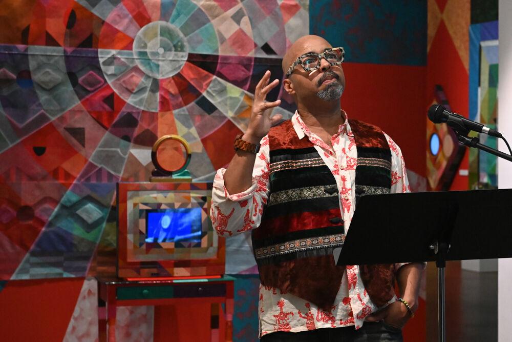 Artist Carl Joe Williams gives a speech and explains the themes of his exhibition at the Gregg Museum of Art &amp; Design on Thursday, Feb. 6, 2025. Williams' immersive exhibition titled "Amazing Grace" explores the complexities of race as a social construct.