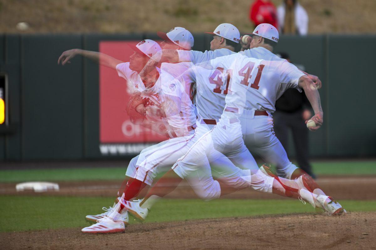 Sophomore pitcher Jacob Dudan throws the ball during the baseball game against Liberty on Doak Field at Dail Park on Tuesday, Feb. 18, 2025. Dudan played for one inning and struck out one player. NC State lost to Liberty 8-9.