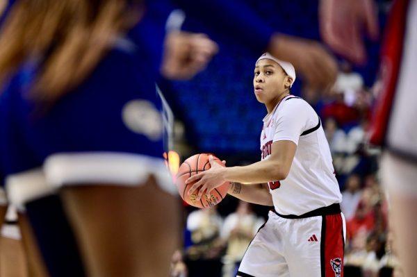 Sophomore guard Zoe Brooks looks for an opening during the quarterfinals game of the ACC Tournament against Georgia Tech on Friday, March 7, 2025. Brooks led in rebounds and assists with nine and four respectively. NC State won the game 73-72.