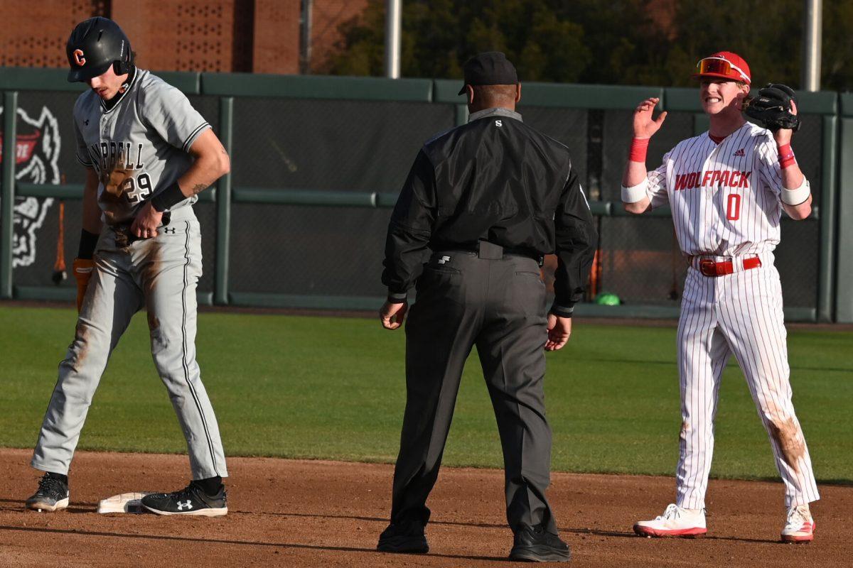 Sophomore infielder Luke Nixon reacts to the runner being ruled safe during the game against Campbell on Doak Field at Dail Park on Wednesday, March 5, 2025. The Wolfpack defeated the Fighting Camels 11-1.
