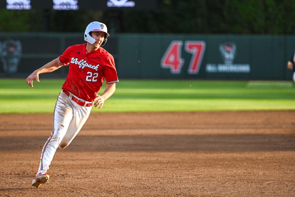Junior outfielder Josh Hogue rounds third base during the game against UNC-Greensboro on Doak Field at Dail Park on Tuesday, April 1, 2025. Hogue recorded four hits and drove in two runs. The Wolfpack defeated the Spartans 9-6.&#160;
