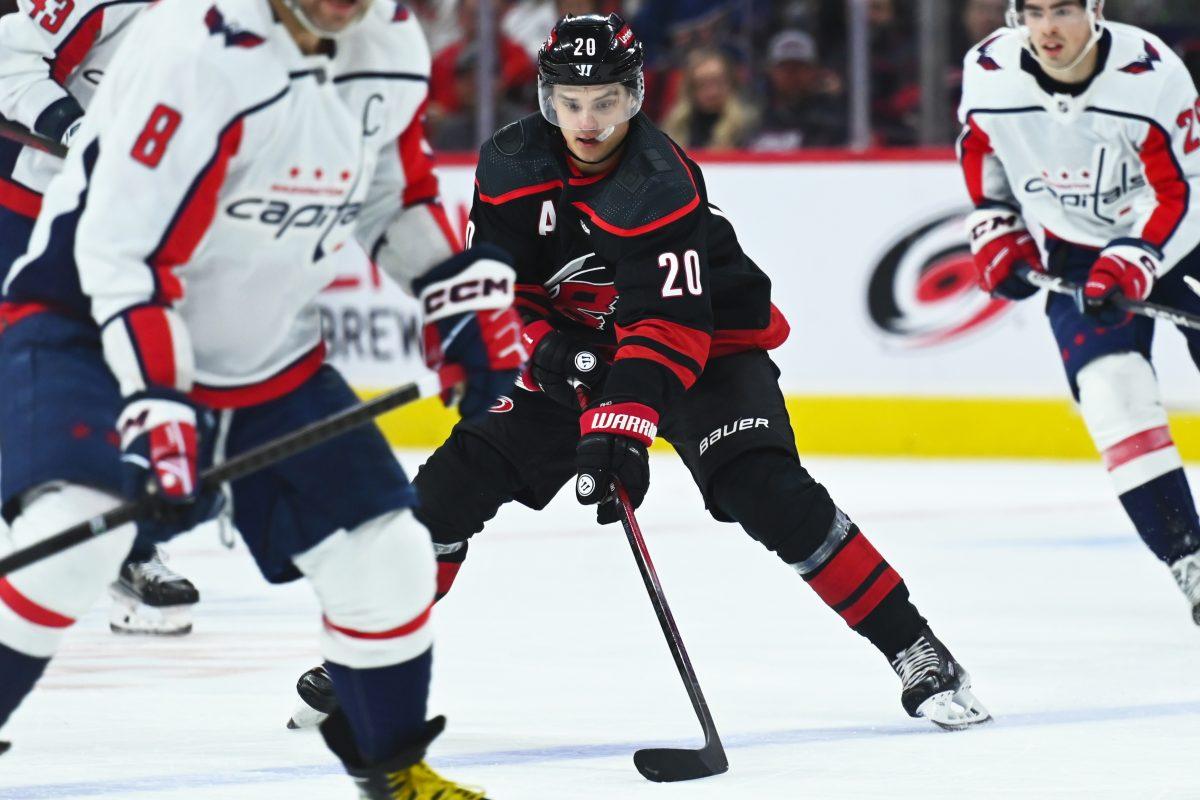 Center Sebastian Aho gets control of the puck during the Carolina Hurricanes game versus the Washington Capitals at PNC Arena on Friday, April 5, 2024. Aho scored one goal for the Hurricanes. The Hurricanes beat the Capitals 4-2.