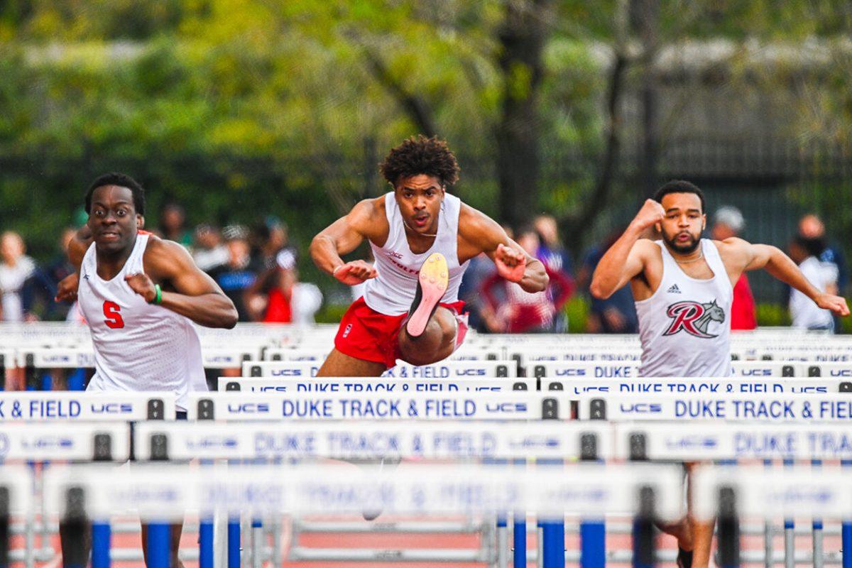 Sophomore hurdler Xavier Branker leaps over the hurdle in the 110m hurdles preliminary during the Duke Invitational at the Morris Williams Stadium on Friday, April 10, 2025. Branker finished third in his heat with a time of 14.48.