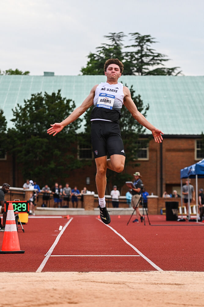 Sophomore jumper Tyson Adams jumps into the sand pit during the ACC Outdoor Track and Field Championships in Kentner Stadium on Friday, May 16, 2025. Adams won the championship with a best jump of 7.69 meters.