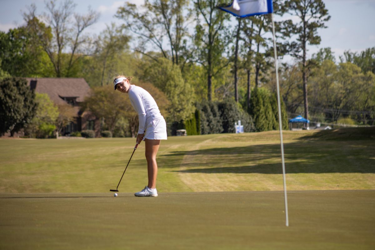 Freshman Marie Eline Madsen hits putt at the 2025 ACC Championship, taking place in Greensboro at Sedgefield Country Club April 16-19. Madsen finished T11 in the tournament.