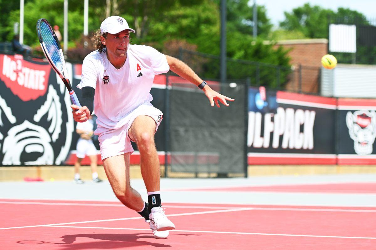 Junior Martin Borisiouk races for the ball during the NCAA first round match versus South Carolina State at J.W. Isenhour Tennis Center on Saturday, May 3, 2025. Borisiouk and Nedelchev won their doubles match 6-1. The Wolfpack beat the Bulldogs 4-0.