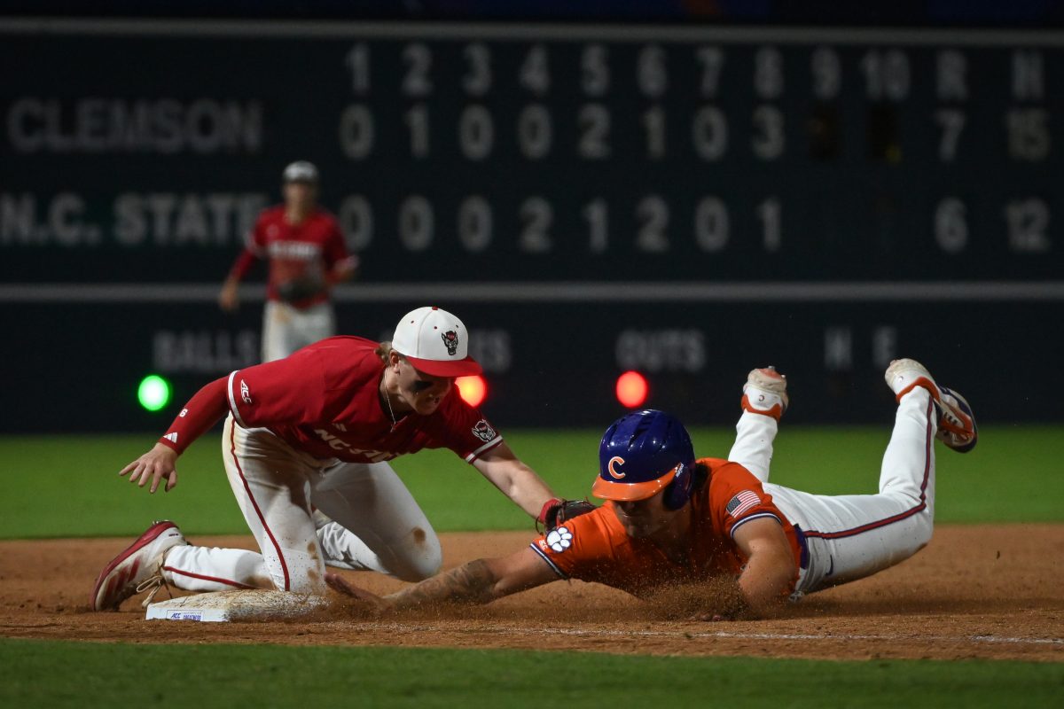 Junior infielder Matt Heavner applies the tag on a base runner for the out during the quarterfinals of the ACC Baseball Tournament&#160;against the Clemson Tigers at the Durham Bulls Athletic Park on Thursday, May 22, 2025. The Tigers defeated the Wolfpack 7-6 to advance to the semifinals.