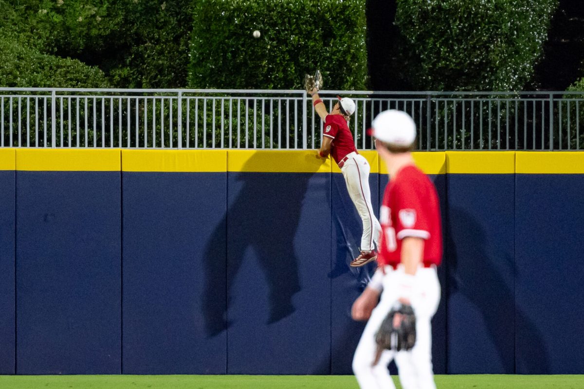 Freshman outfielder Ty Head attempts to catch a home run during the game against the Clemson Tigers at the Durham Bulls Athletic Park for the quarterfinals of the ACC Baseball Tournament on Thursday, May 22, 2025. Head had three hits and scored one run. NC State lost to Clemson 7-6.&#160;