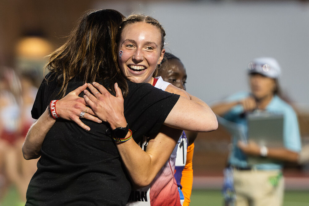 Junior distance runner Grace Hartman hugs head coach Laurie Haines after winning the women's 5000m during the ACC Outdoor Track and Field Championships in Kentner Stadium on Saturday, May 18, 2025. Hartman placed first and set a meet record with a time of 13:12.03.