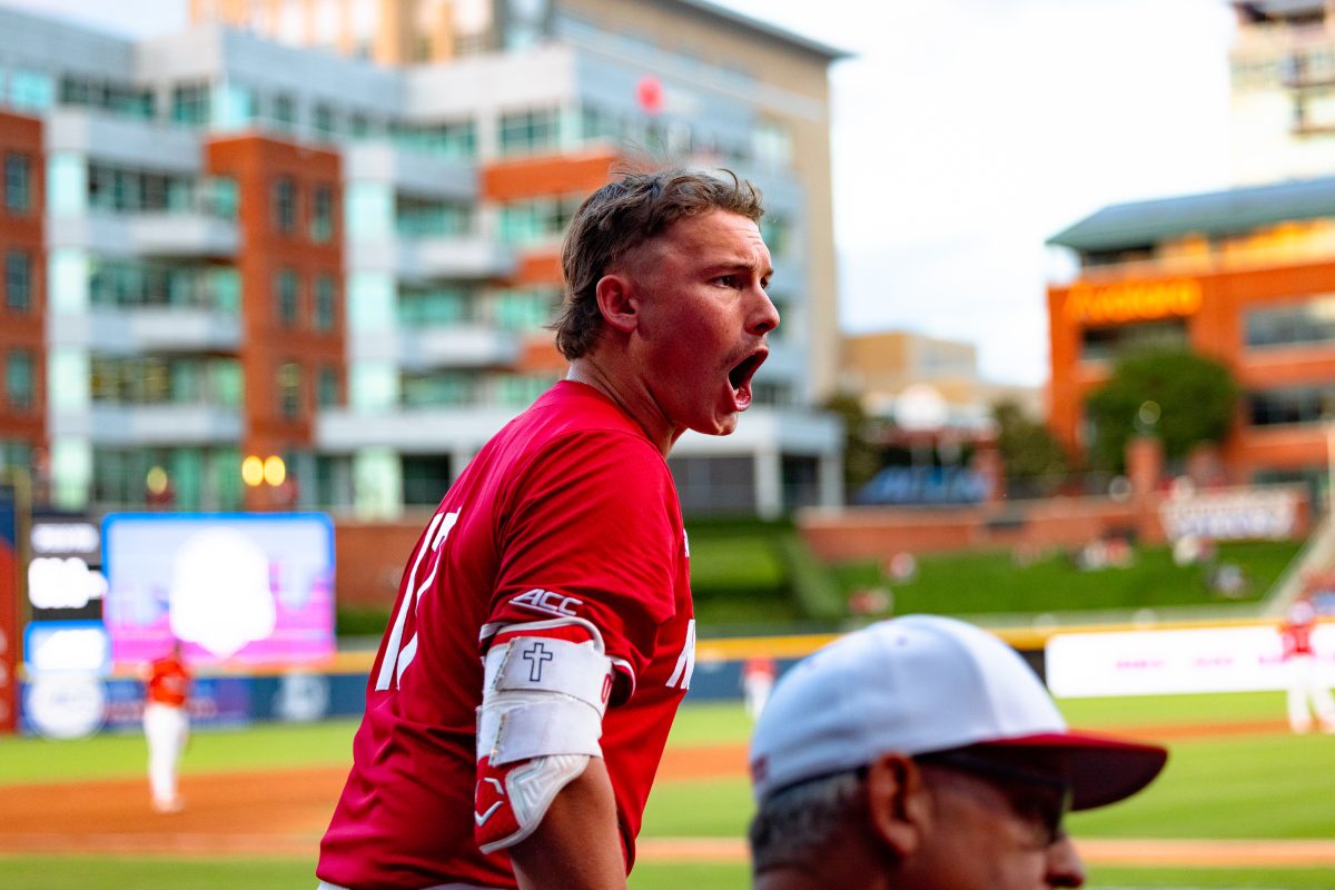 Sophomore outfielder Matt Ossenfort screams from the dugout during the quarterfinals of the ACC Baseball Tournament against Clemson at the Durham Bulls Athletic Park on Thursday, May 22, 2025. Ossenfort walked three times during the game. NC State lost to Clemson 7-6.