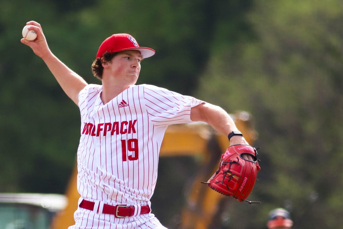 Sophomore pitcher Heath Andrews throws a pitch during the game against Virginia at Doak Field at Dail Park on Saturday, April 5, 2025. The Wolfpack beat the Cavaliers 9-2.