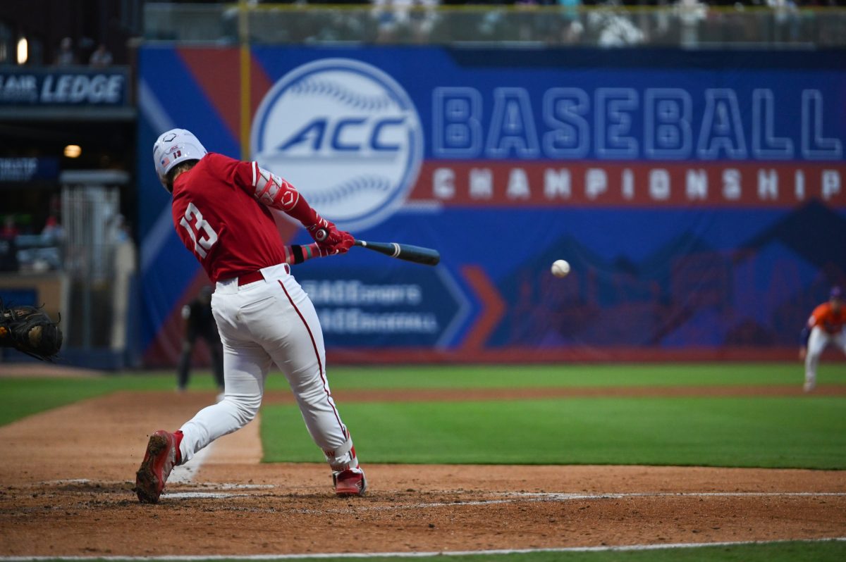 Sophomore catcher Alex Sosa hits during the Wolfpack's game against the Clemson Tigers at the Durham Bulls Athletic Park for the quarterfinals of the ACC Baseball Tournament on Thursday, May 22, 2025. The Tigers defeated the Wolfpack 7-6 to advance to the semifinals.