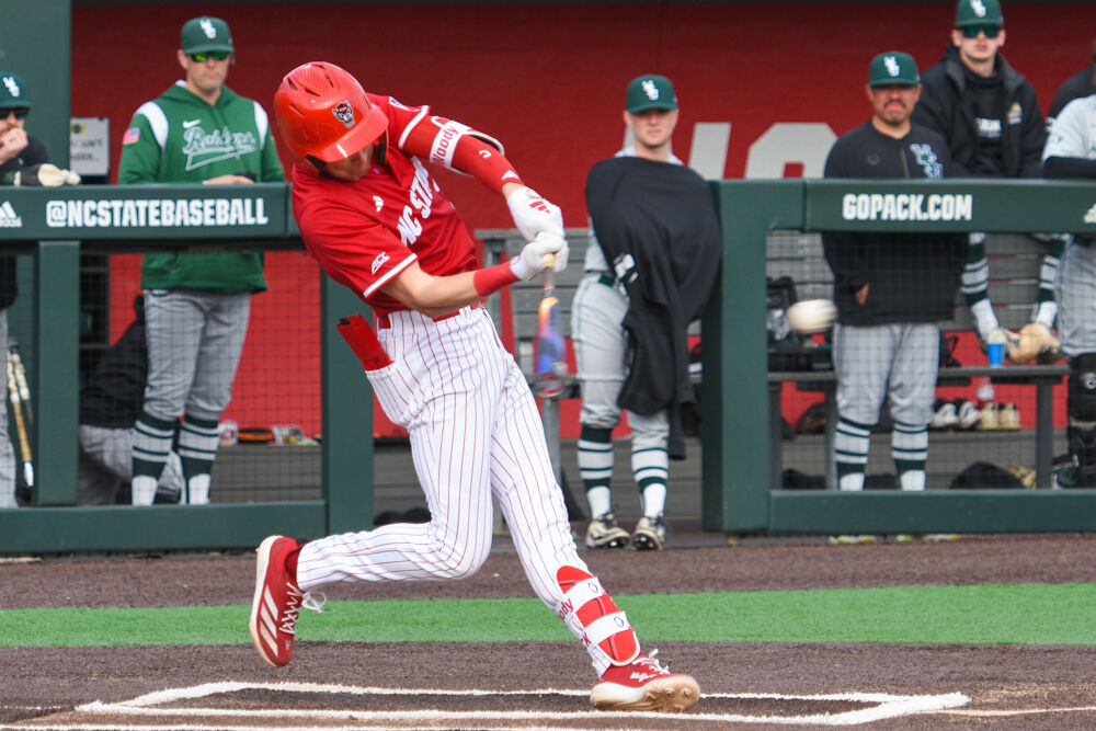 Freshman infielder Ryder Woodson takes a swing at the ball during the game against Wright State on Doak Field at Dail Park&#160;on Friday, March 7, 2025. Woodson scored one of the six runs for the Wolfpack. The Wolfpack won against the Raiders 6-4.