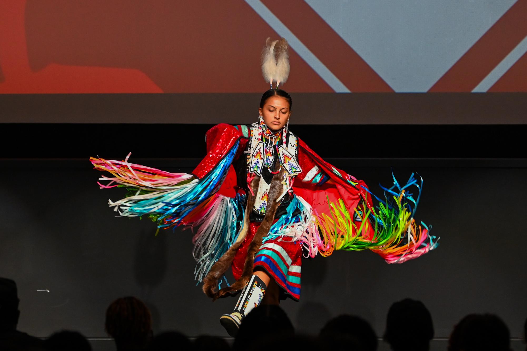 Charlize Sankee, a fourth-year studying psychology, performs in traditional Native American attire on Aug. 13, 2025 in Witherspoon Student Center during the Greek and Culture Showcase. The Greek and Culture Showcase allows students to observe the variety of cultures on NC State’s Campus.