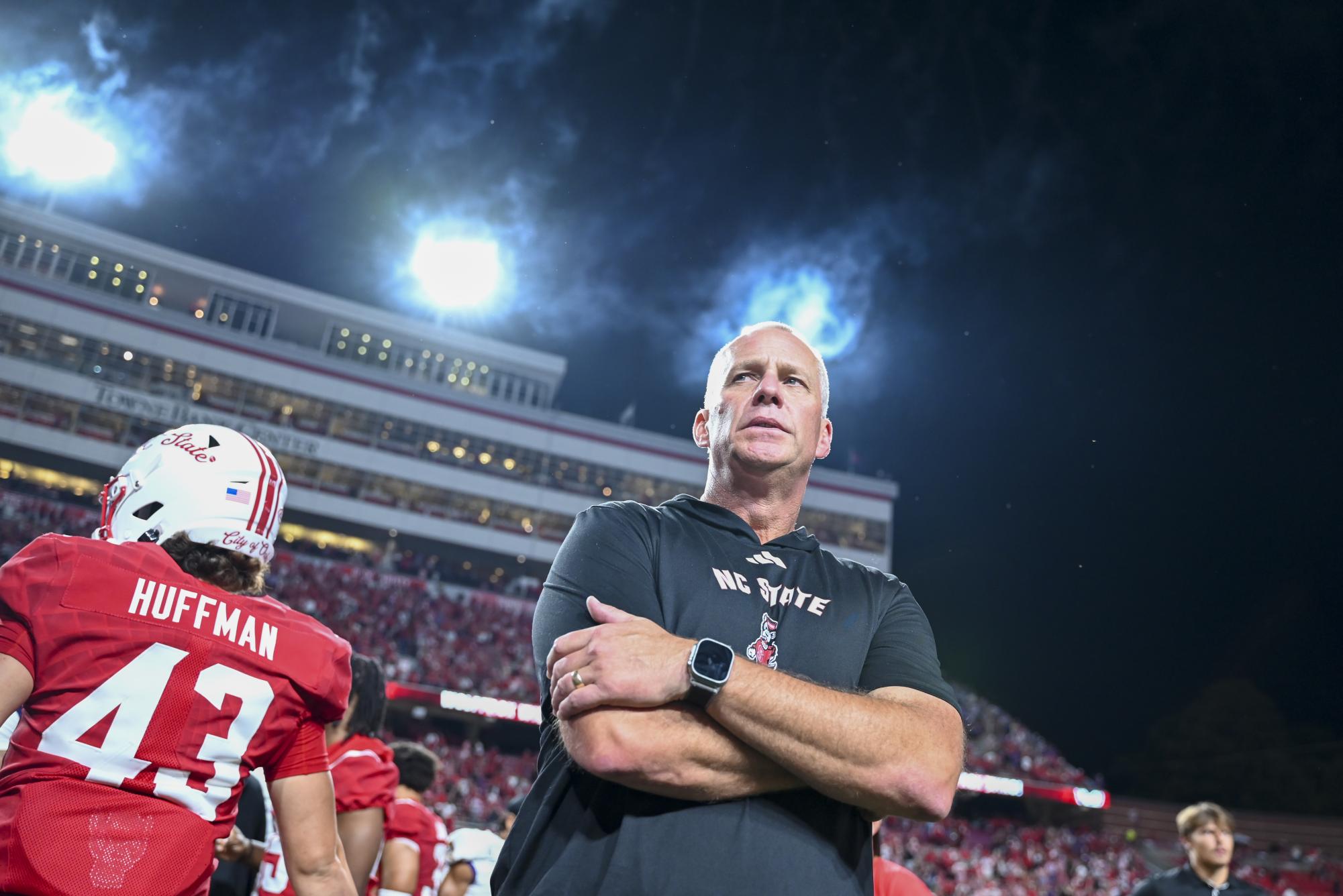 NC State head football coach Dave Doeren looks out into the field after the game against East Carolina at Carter-Finley Stadium on Thursday, Aug. 28, 2025. NC State beat ECU 24-17.