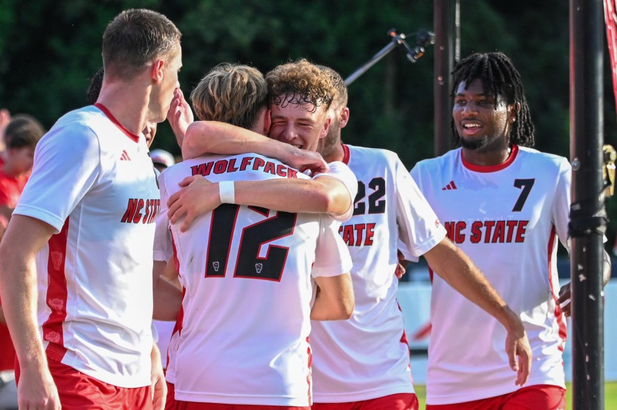 Freshman defender Riley Moloney hugs his teammate, junior midfielder Tyler Caton, during the game against Wofford at Dail Soccer Field on Sunday, Aug. 24, 2025. Moloney and Caton combined for one goal and two assists. NC State beat Wofford 6-0.