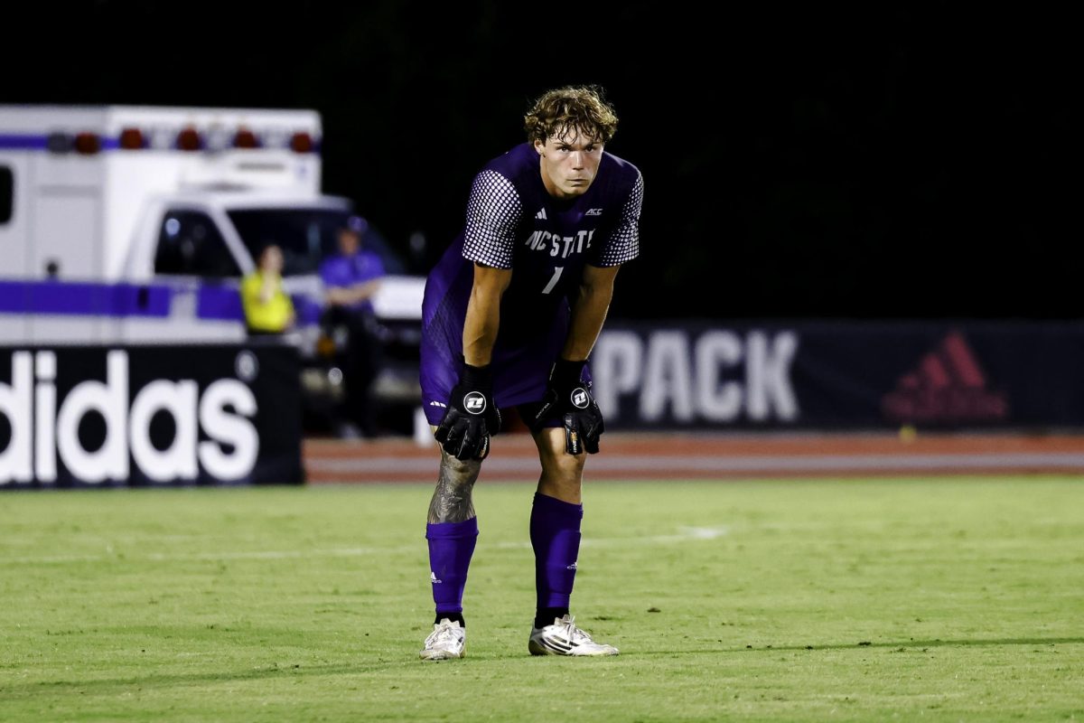 Senior goalkeeper Logan Erb scans the field during the game against Queens at Dail Soccer Field on Thursday, Aug. 21, 2025. Erb allowed no goals while playing 90 minutes. NC State beat Queens 2-0.
