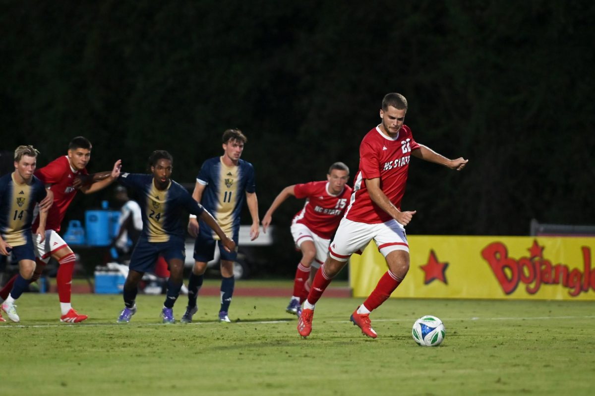 Senior midfielder Drew Lovelace takes a penalty kick during the match versus FIU at Dail Soccer Field on Sunday, Aug. 24, 2025. Lovelace scored one goal for the Wolfpack. NC State beat FIU 2-0.