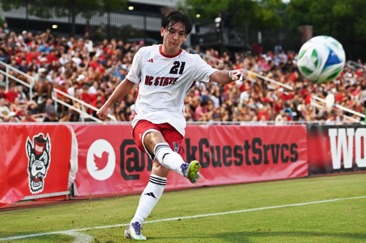 Fifth-year midfielder Max Ogawa takes a corner kick during the match versus Wofford at Dail Soccer Field on Sunday, Aug. 24, 2025. Ogawa scored one goal for the Wolfpack. NC State beat Wofford 6-0.
