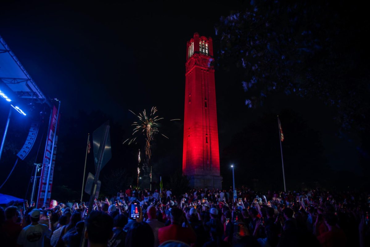 Fireworks shoot off to the side of the bell tower during the finale of Packapalooza on Saturday, Aug. 23, 2025. This year’s festival featured a mix of live music and performances across multiple stages featuring a performance by musical headliner Saved by the 90s.