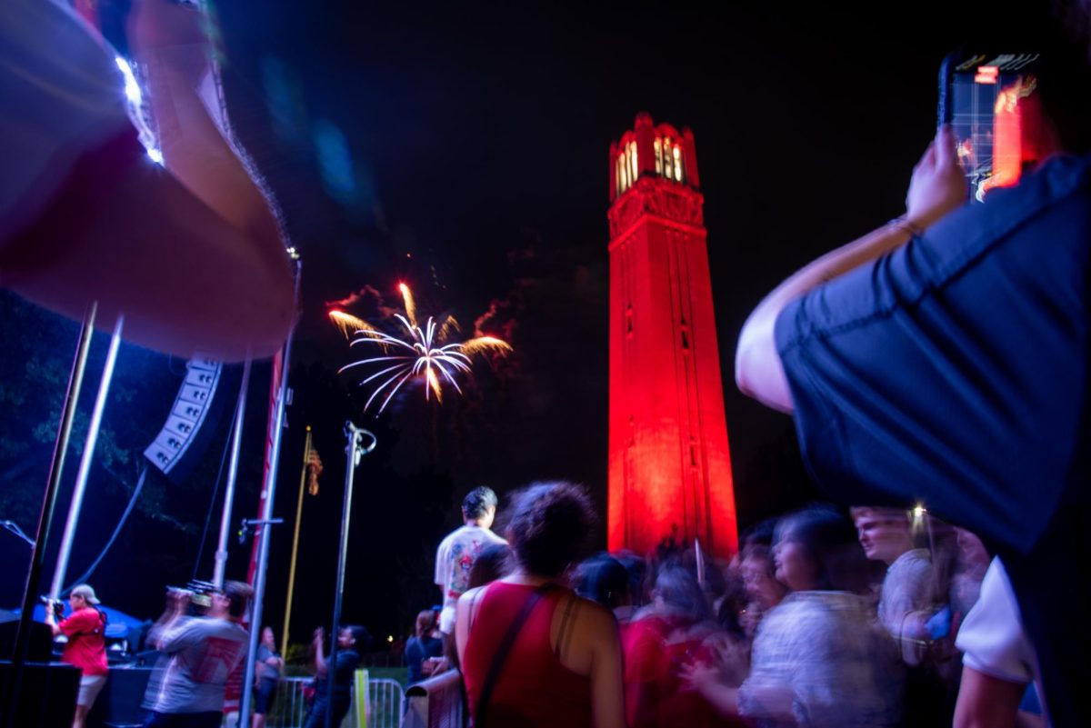 Fireworks shoot off to the side of the bell tower during the finale of Packapalooza on Saturday, Aug. 23, 2025. This year’s festival featured a mix of live music and performances across multiple stages featuring a performance by musical headliner Saved by the 90s.