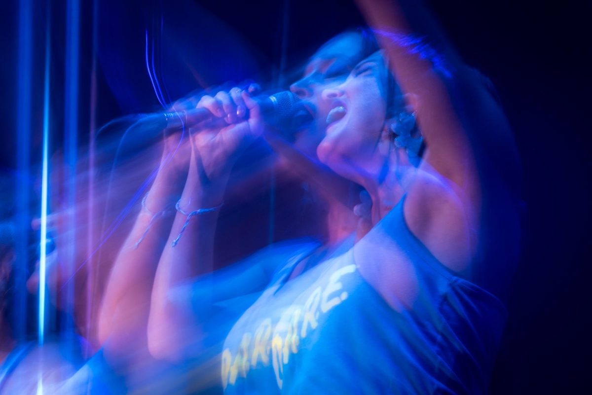 Singer Eden Mendez of the band Saved by the 90's performs during the grand finale of Packapalooza on Saturday, Aug. 23, 2025. The festival featured a mix of live music and performances across multiple stages headlined by Saved by the 90s.